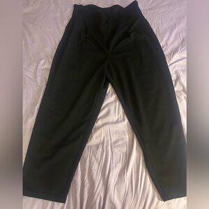 Never worn. Criss cross trousers, size 3X.